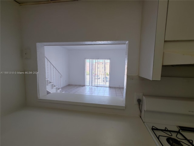 1305 W 53rd St Unit 410, Hialeah, FL 33012 - detailed view of stove and range hood