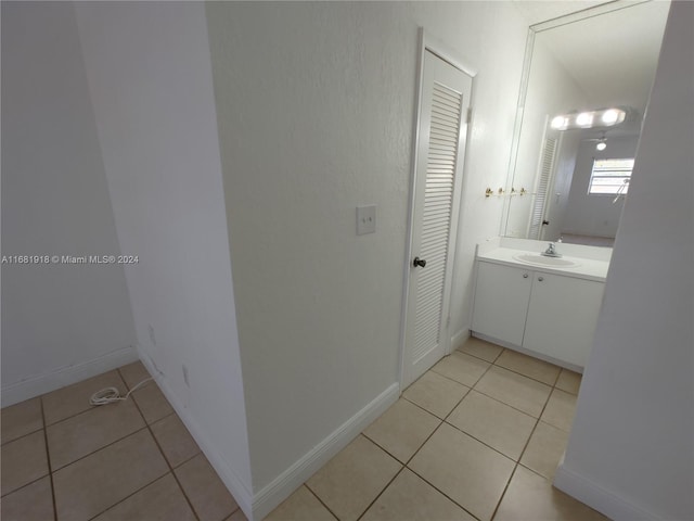 bathroom featuring vanity and tile patterned flooring