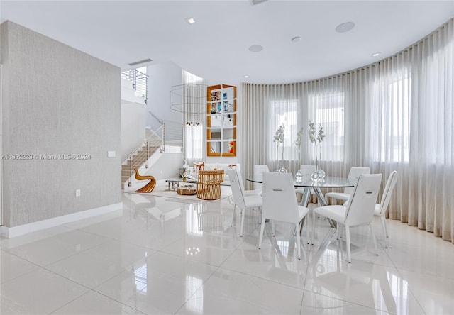 dining area featuring light tile patterned floors