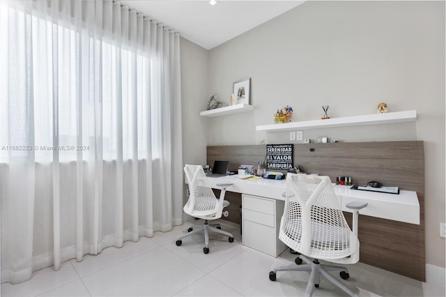 office area with light tile patterned floors