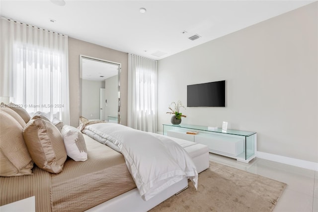 bedroom featuring multiple windows