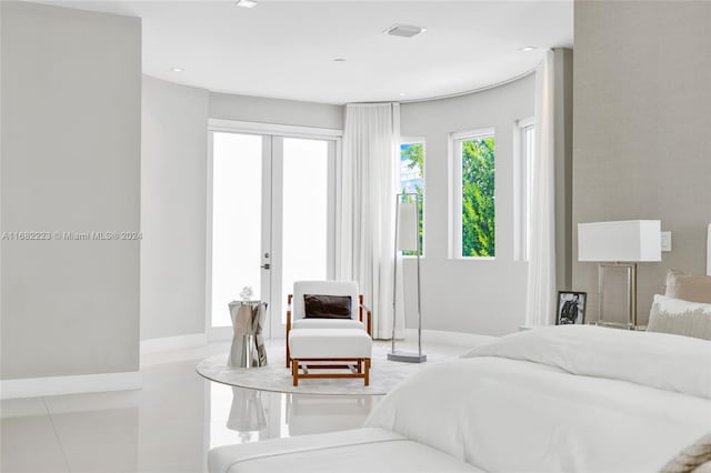 bedroom featuring light tile patterned flooring