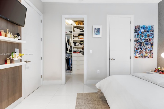 bedroom featuring light tile patterned floors