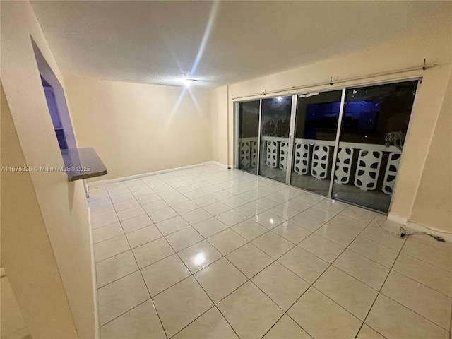 view of tiled spare room