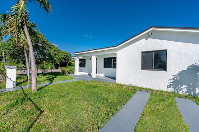 exterior space featuring a yard