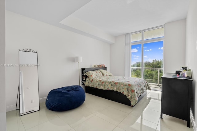 bedroom with light tile patterned floors