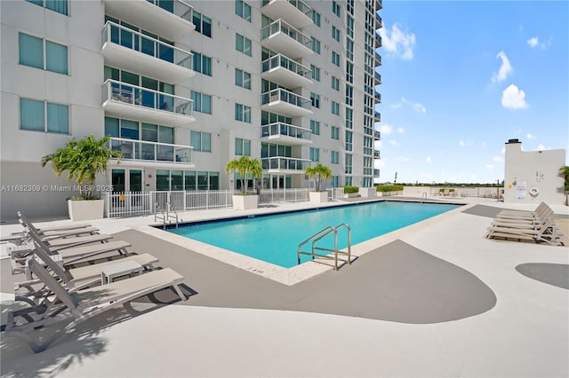 view of pool featuring a patio area