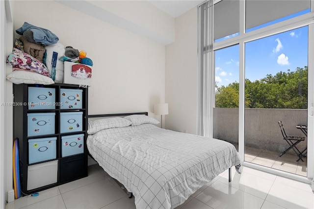 tiled bedroom featuring multiple windows