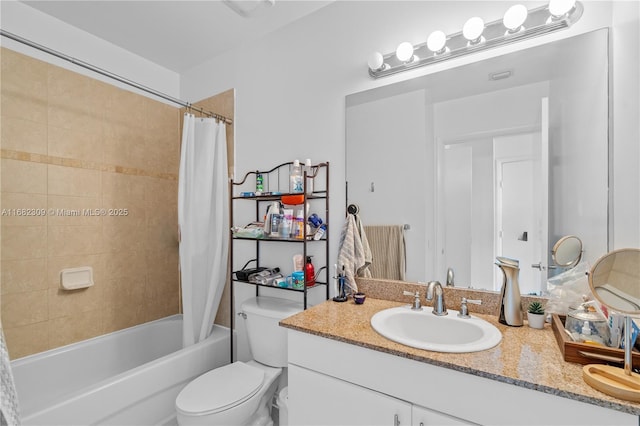 full bathroom featuring vanity, shower / tub combo with curtain, and toilet