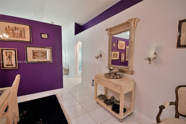 hallway with light tile patterned floors