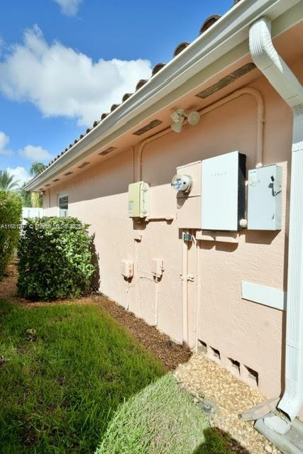 view of home's exterior with stucco siding