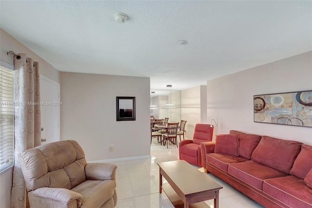 living room with light tile patterned flooring