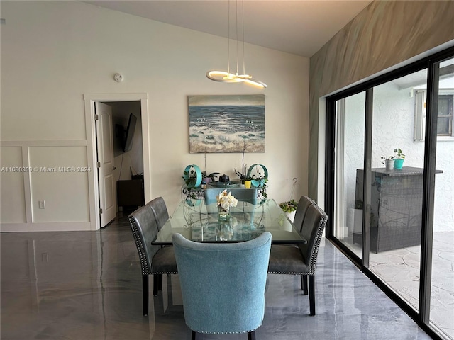 dining area with lofted ceiling