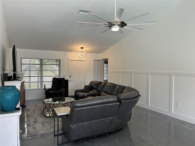 living room featuring vaulted ceiling and ceiling fan