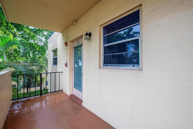 doorway to property with a balcony