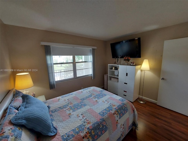 bedroom featuring hardwood / wood-style floors