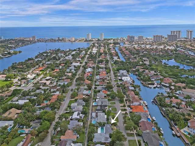 aerial view with a water view and a city view