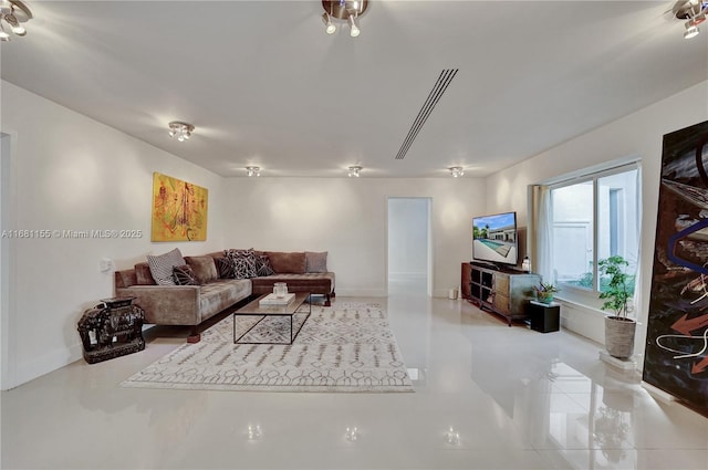 living room featuring baseboards