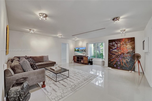 living room featuring baseboards