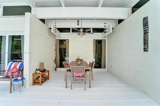 view of patio / terrace featuring a ceiling fan and outdoor dining space