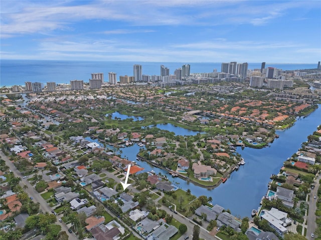 aerial view with a view of city and a water view