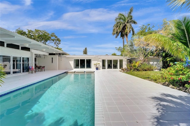 pool with a patio area