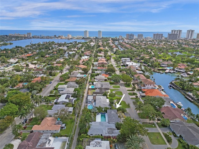 drone / aerial view with a water view