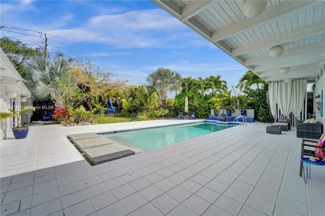 outdoor pool with a patio