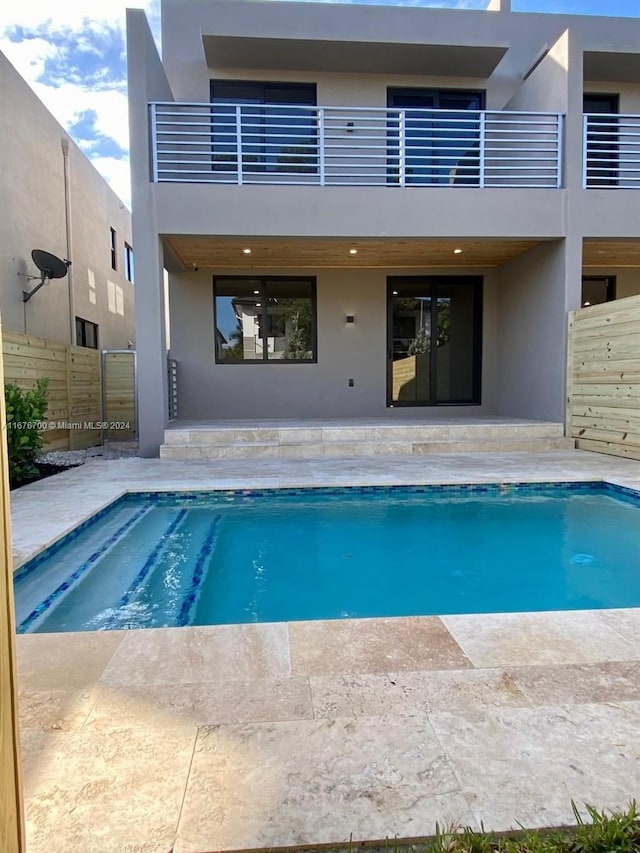 view of pool featuring a patio