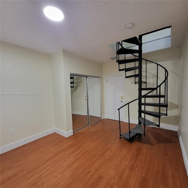 interior space with hardwood / wood-style floors