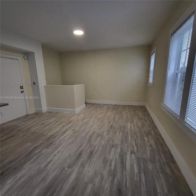 spare room featuring hardwood / wood-style flooring