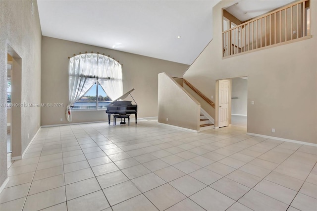 unfurnished living room with light tile patterned flooring