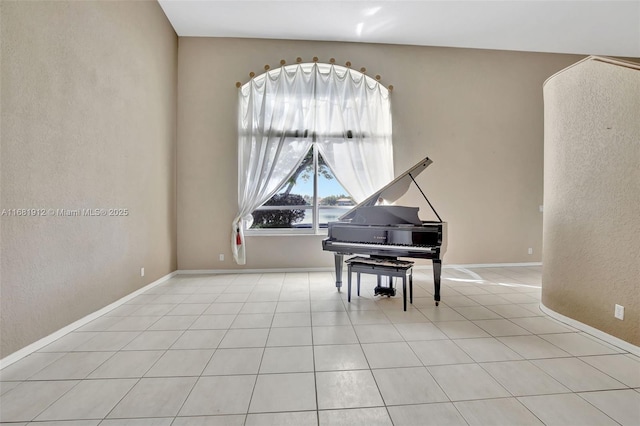 misc room with light tile patterned floors