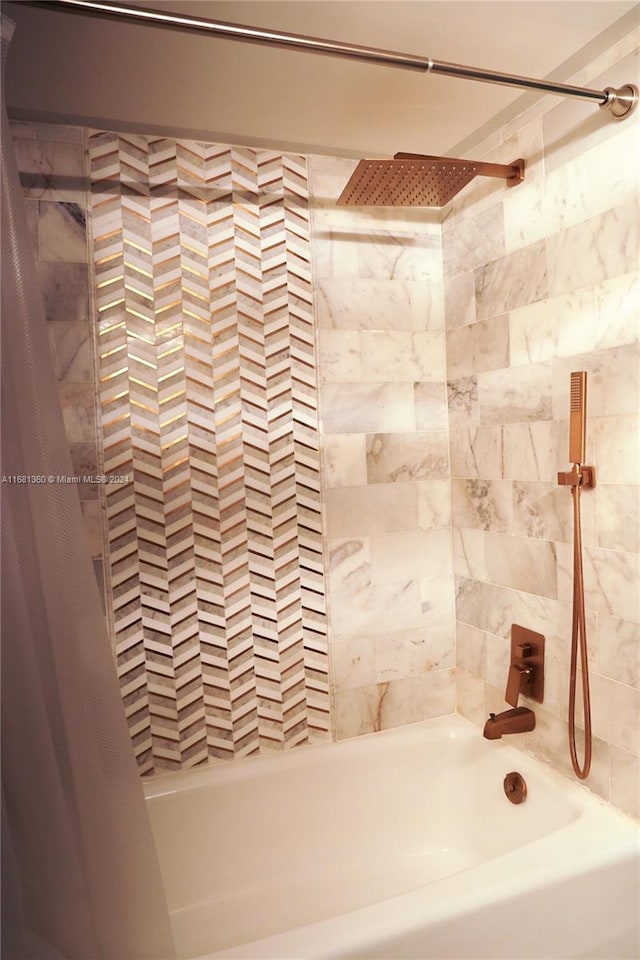 bathroom featuring shower / tub combo with curtain