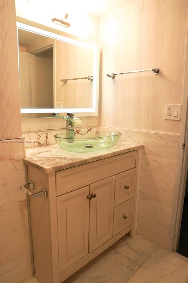 bathroom featuring vanity and tile patterned flooring