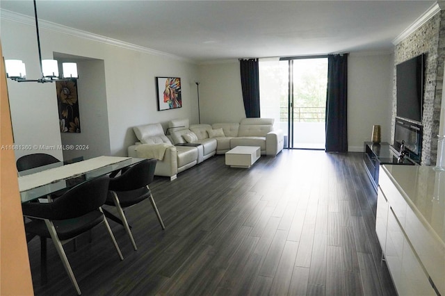 living room featuring ornamental molding, expansive windows, and dark hardwood / wood-style floors