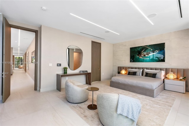 bedroom featuring light tile patterned floors