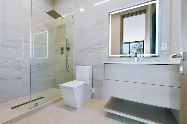 bathroom featuring vanity, tile patterned floors, toilet, and a shower with door