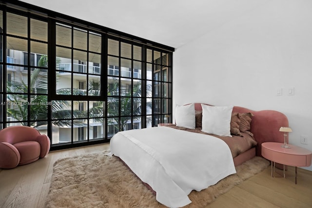 bedroom featuring hardwood / wood-style floors