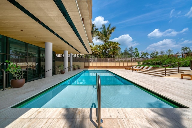 view of swimming pool featuring a patio