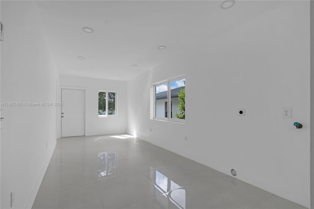 empty room featuring light tile patterned flooring