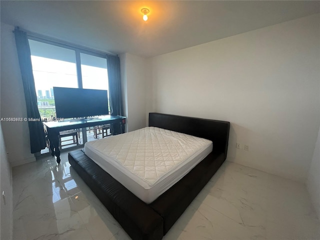 bedroom with marble finish floor