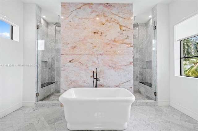 406 Tamarind Dr, Hallandale Beach, FL 33009 - bathroom with a fireplace, a marble finish shower, marble tiled flooring, a freestanding bath, and recessed lighting