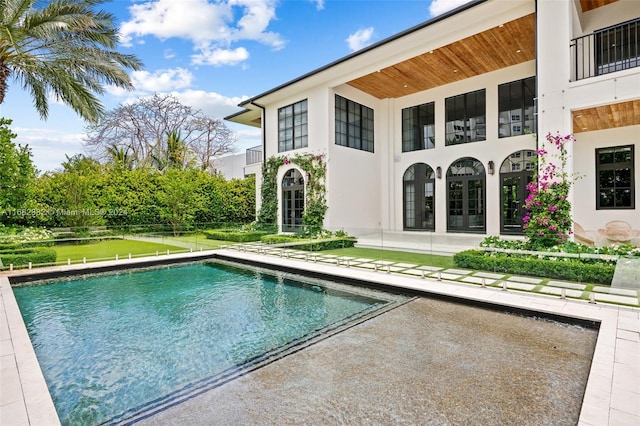 view of pool featuring a patio area