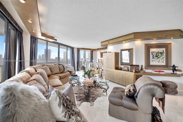 living room with a textured ceiling, light tile patterned floors, and floor to ceiling windows