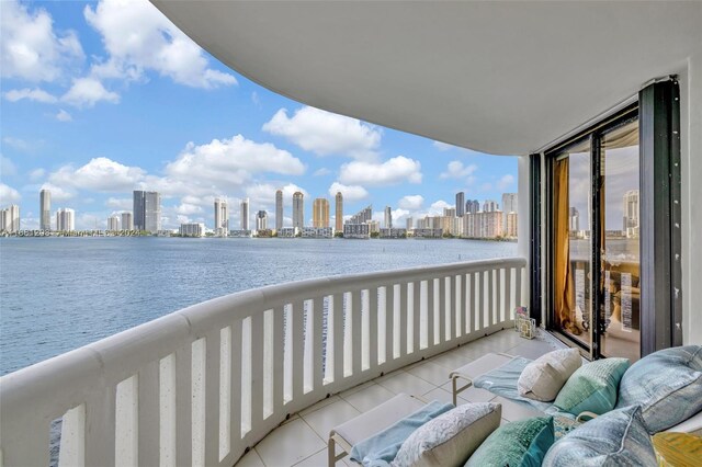 balcony featuring a water view