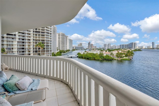 balcony featuring a water view