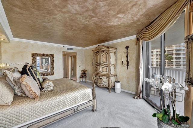 bedroom with ornamental molding and carpet flooring