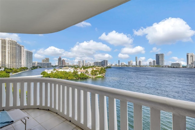 balcony featuring a water view