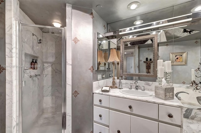 bathroom with vanity and an enclosed shower